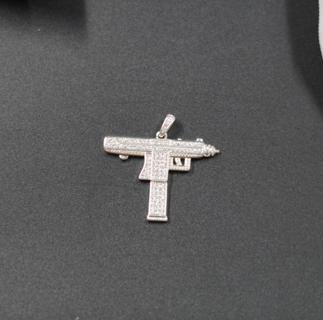 Miniatura 2 de DIJE PISTOLA UZI PLATEADA PIEDRAS BLANCA